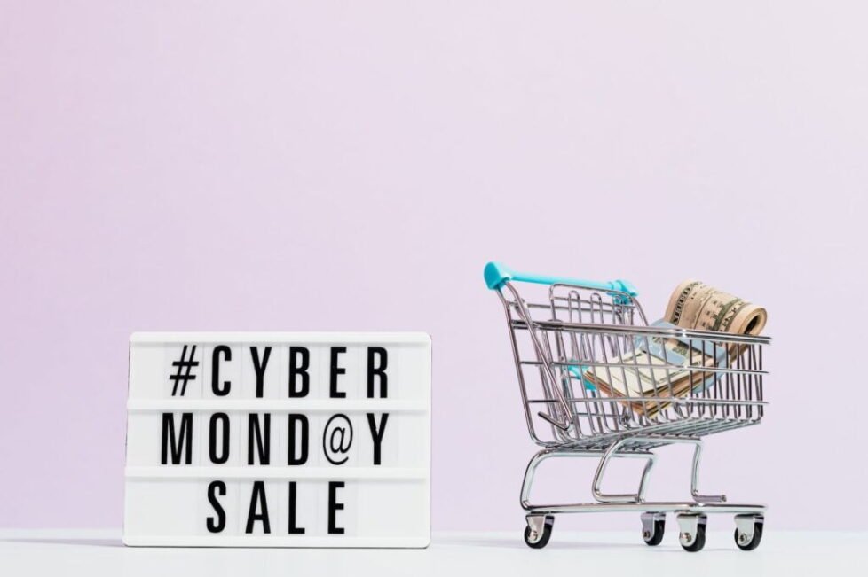 pexels-photo-5632364 tcas money on a shopping cart beside a cyber monday sale signext